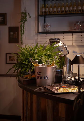 Roma Pizzeria - Gastronomia