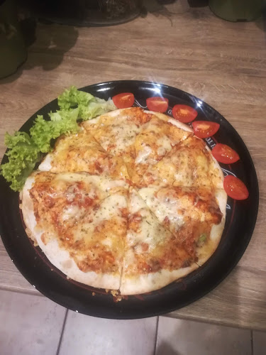 https://www.pizzeriastodola.com/